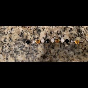 Swarowski crystal football bracelet.